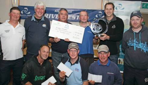 Main man Dave Harrell and Angling Trust boss Mark Lloyd present the cheques and trophy to 'Spud Murphy and the other winners