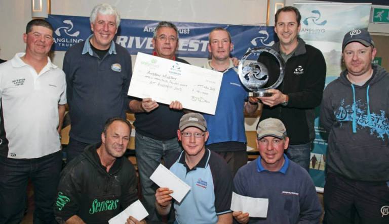RiverFest founder Dave Harrell and Angling Trust boss Mark Lloyd present the cheques and trophy to 'Spud Murphy and the other winners of a great two day final on the Wye at Hereford